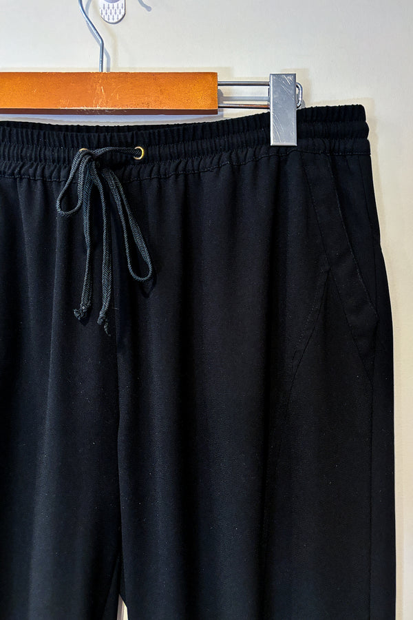 Pantalon noir avec taille et chevilles élastique (m) seconde main Adrianna Papell 
