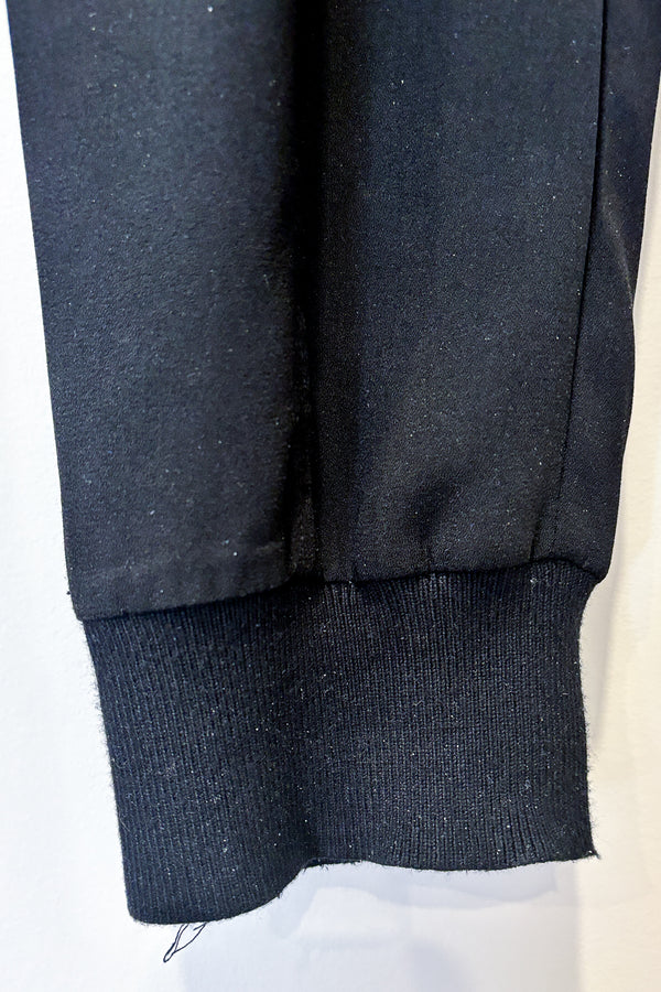 Pantalon noir avec taille et chevilles élastique (m) seconde main Adrianna Papell 