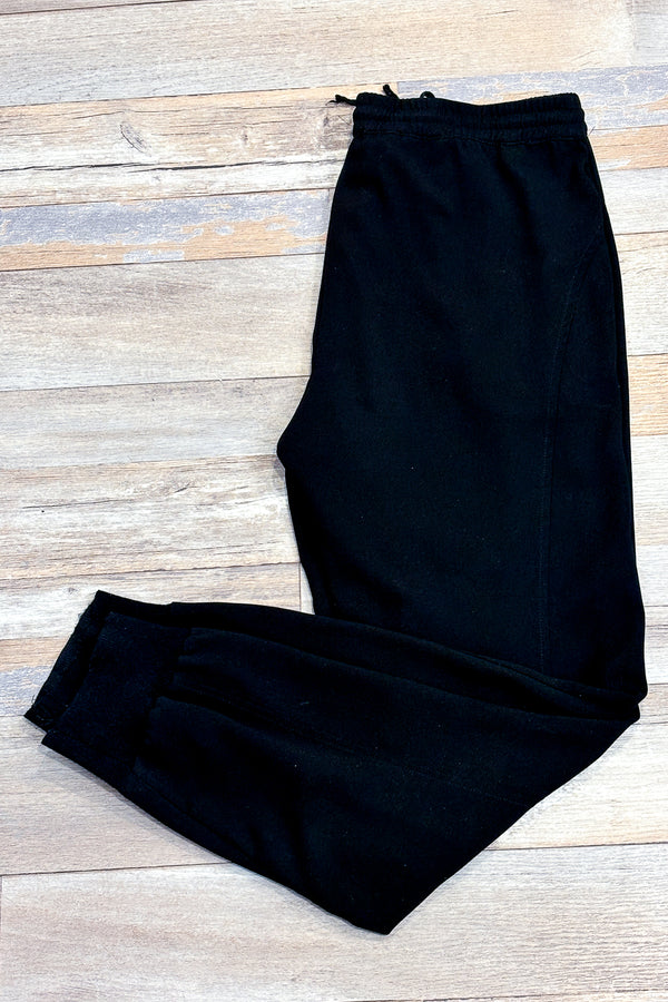 Pantalon noir avec taille et chevilles élastique (m) seconde main Adrianna Papell 