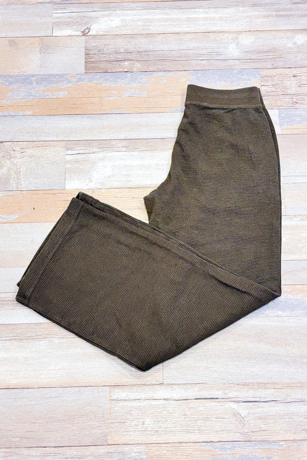 Pantalon lounge gaufré kaki seconde main - Uniqlo- La Penderie du Paradis