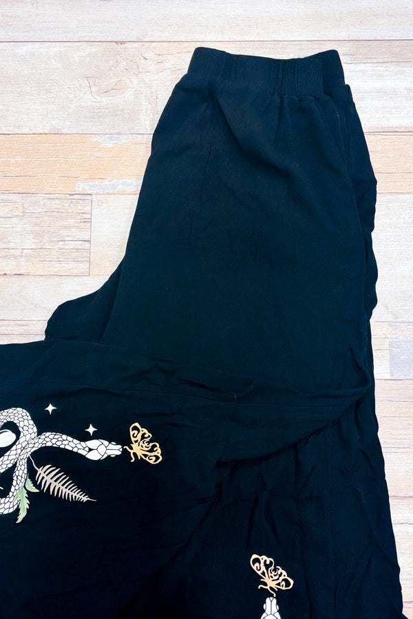 Pantalon large noir gothique à imprimé serpent et plantes seconde main - Romwe- La Penderie du Paradis