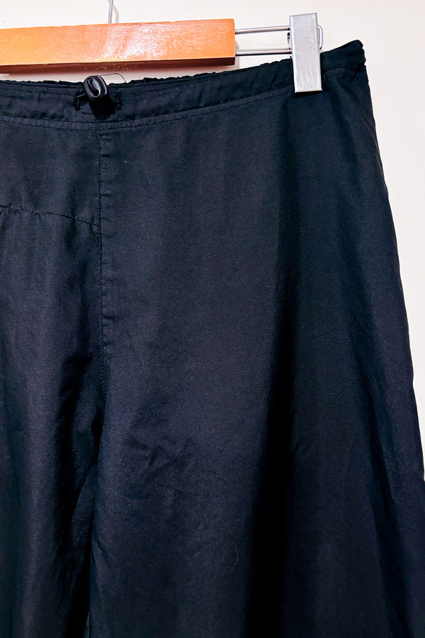 Pantalon noir coupe-vent seconde main - Orage- La Penderie du Paradis