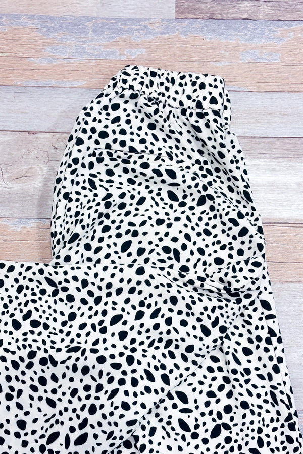 Pantalon fluide ample crème et noir motif animal * seconde main - La Penderie du Paradis- La Penderie du Paradis