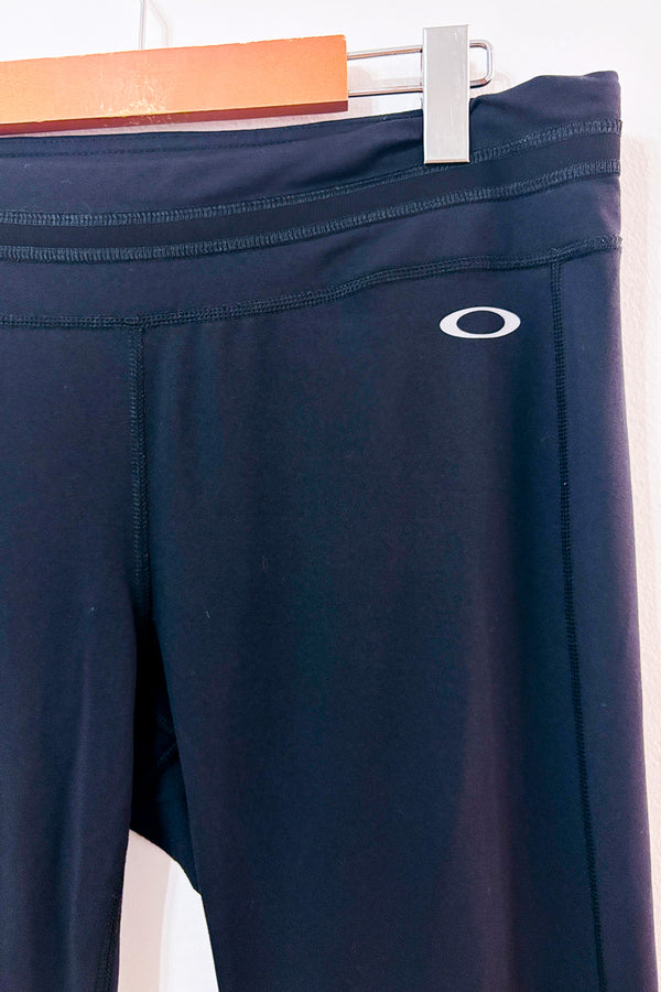 Pantalon sport noir à jambe évasée seconde main - Oakley- La Penderie du Paradis
