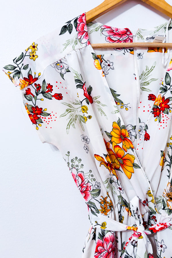 Jumpsuit blanc fleuri cache-coeur seconde main - SWS Streetwear Society- La Penderie du Paradis