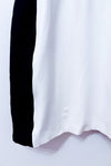 Robe ajustée noire et blanche à paillettes et bande rouge* seconde main - Love Moschino- La Penderie du Paradis
