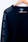 Robe noire en tricot à logos sur les manches* seconde main - DKNY- La Penderie du Paradis