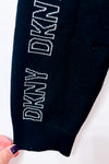 Robe noire en tricot à logos sur les manches* seconde main - DKNY- La Penderie du Paradis