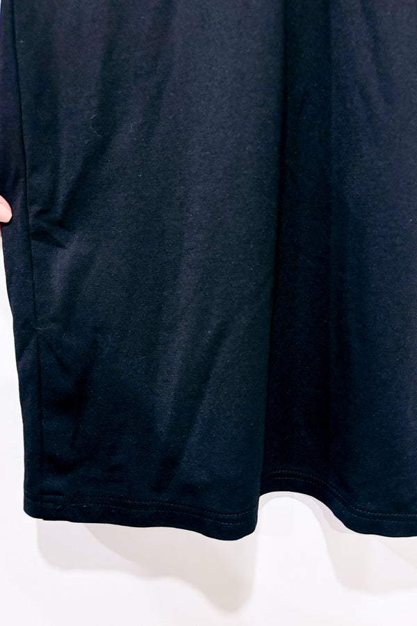 Robe noire ajustée avec motif cheetah aux manches* seconde main - EsQualo- La Penderie du Paradis