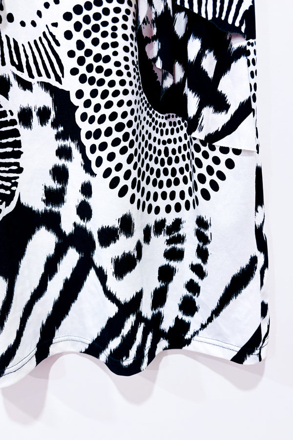 Robe noire et blanche à motifs et volants seconde main - Papillon- La Penderie du Paradis