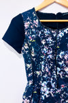 Robe noire et multicolore détails faux cuir seconde main - Club Monaco- La Penderie du Paradis