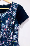 Robe noire et multicolore détails faux cuir seconde main - Club Monaco- La Penderie du Paradis