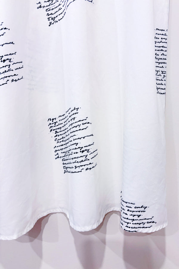Robe blanche avec motif texte seconde main - Misslook- La Penderie du Paradis