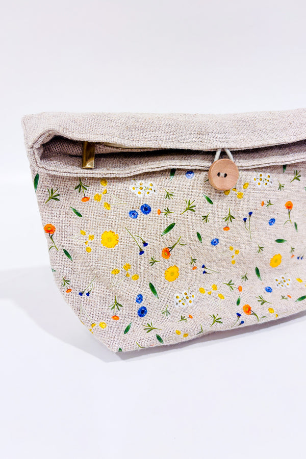 Trousse cosmétique beige avec fleurs seconde main - Yves Rocher- La Penderie du Paradis