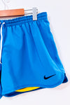 Short Dri-Fit bleu avec short intégré seconde main - Nike- La Penderie du Paradis