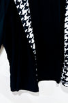 Veste courte noire et blanche motif pied de poule (m/l) -- La Penderie du Paradis ?