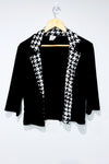 Veste courte noire et blanche motif pied de poule (m/l) -- La Penderie du Paradis ?