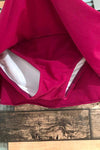 Bas de maillot de bain jupe-culotte fuchsia et kaki (l) seconde main Lolë 