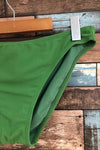 Bas de maillot de bain vert avec logo jaune (l) seconde main Lolë 