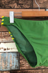 Bas de maillot de bain vert avec logo jaune (l) seconde main Lolë 