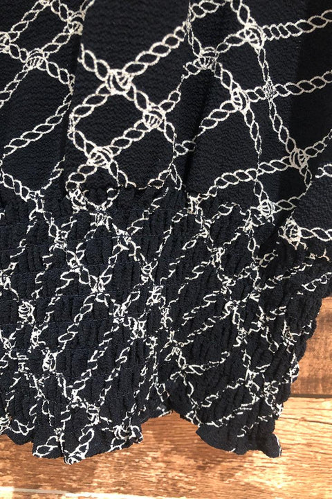 Haut marine motif noeuds avec taille élastique (s) seconde main Suzy Shier   