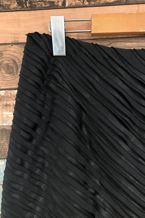 Jupe noire avec petits volants (m) seconde main Calvin Klein   