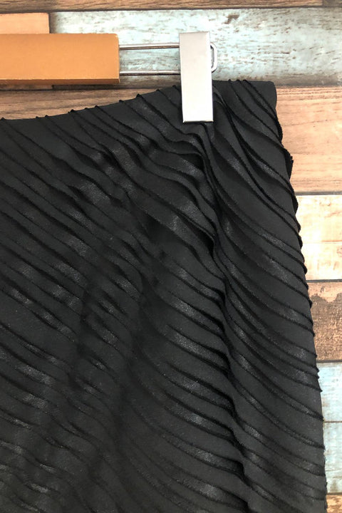 Jupe noire avec petits volants (m) seconde main Calvin Klein   