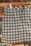 Jupe-short imperméable bleue et brune à carreaux (l) seconde main Lolë 