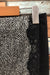 Jupe texturée noire avec fleurs (m) seconde main Perruzi   