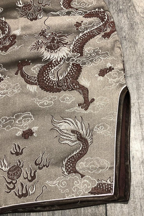 Robe brune motif dragon (l) seconde main Expression de la vie   